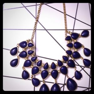 A blue and gold necklace